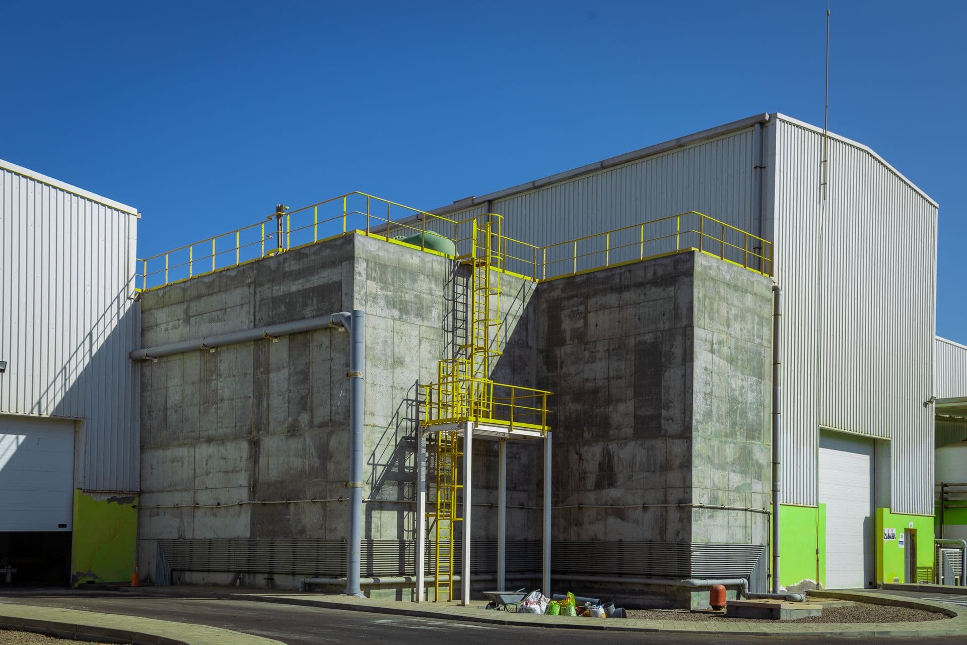 Industrial building exterior, concrete and steel architecture